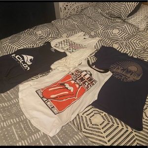 4 total (3 L tanks 1 XL tee fits like a large)